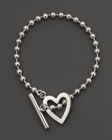 gucci silver toggle heart beaded bracelet|gucci trademark charm bracelet.